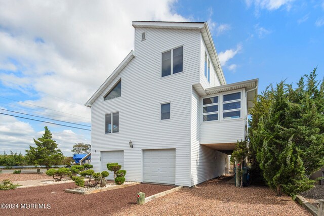 exterior space with a garage