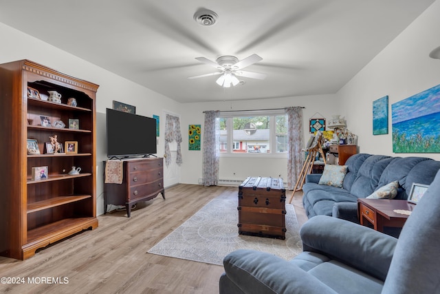 living room featuring ceiling fan and light wood-type flooring