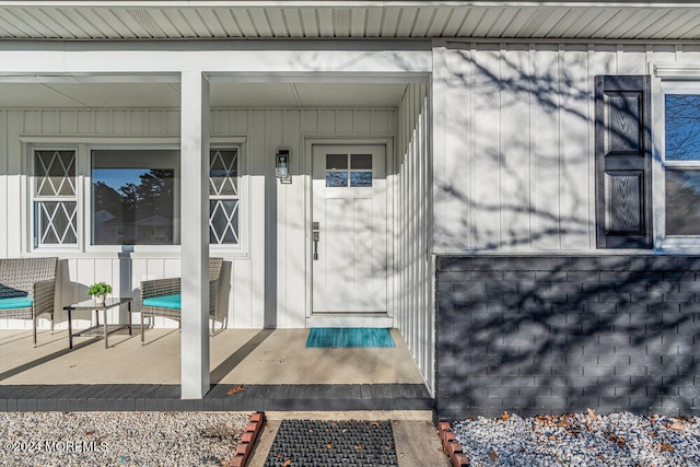 property entrance with a porch