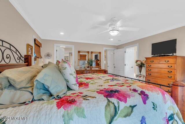 bedroom with ceiling fan and crown molding