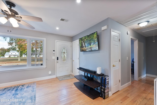 entryway with light hardwood / wood-style flooring and ceiling fan