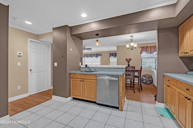 kitchen featuring hanging light fixtures, light hardwood / wood-style floors, dishwasher, sink, and a chandelier