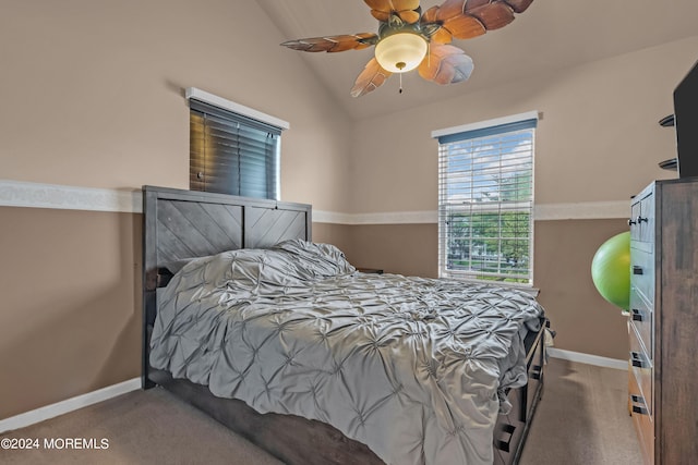 carpeted bedroom featuring lofted ceiling and ceiling fan