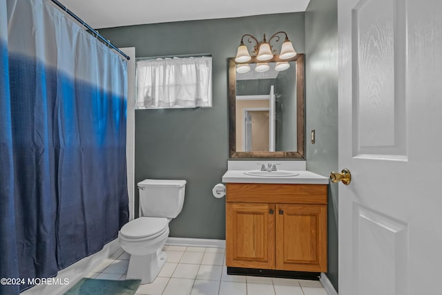 bathroom featuring tile patterned flooring, vanity, toilet, and a shower with curtain