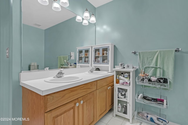 bathroom with tile patterned flooring and vanity