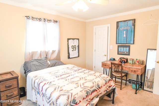 bedroom with ceiling fan, ornamental molding, and carpet