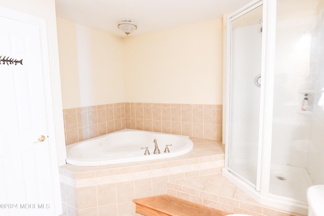 bathroom with independent shower and bath