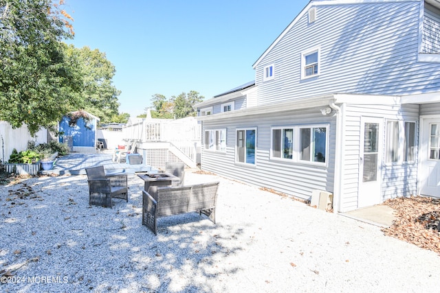 view of patio with an outdoor fire pit