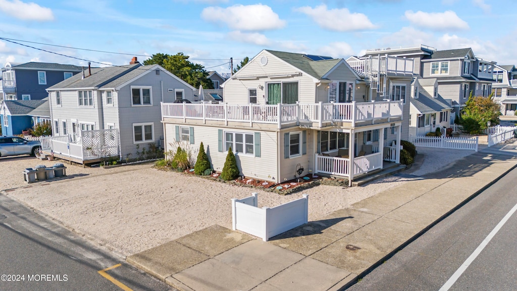 view of property with a balcony