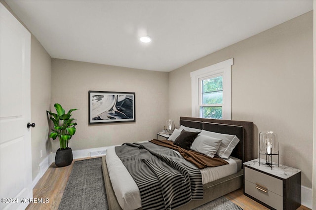 bedroom featuring light wood-type flooring