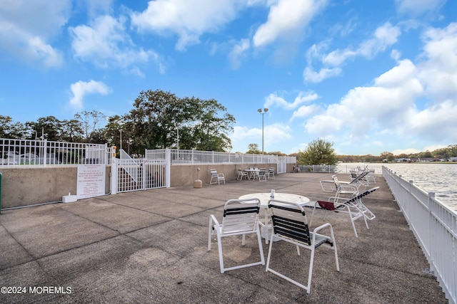 view of patio / terrace featuring a water view