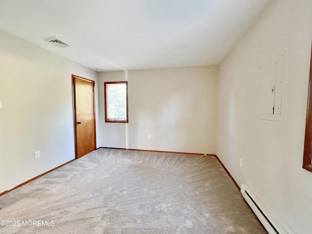 unfurnished room with a baseboard radiator, baseboards, visible vents, and carpet