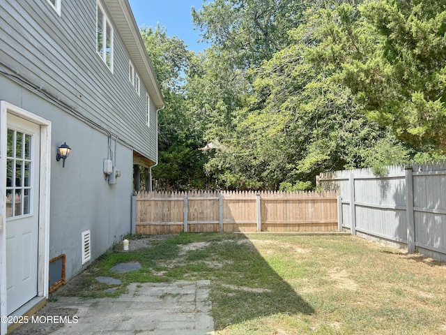 view of yard featuring a fenced backyard