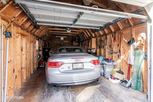 garage with wood walls