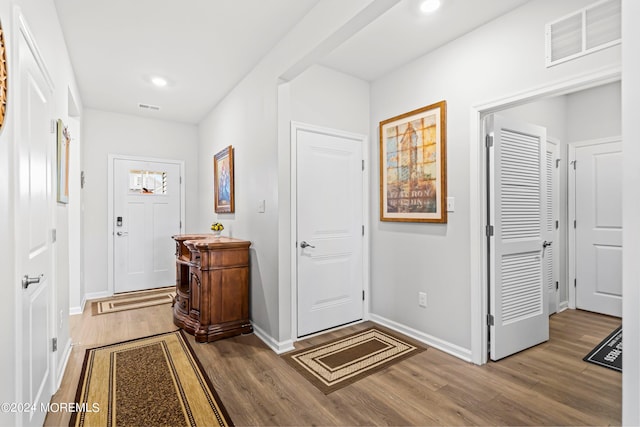 interior space with hardwood / wood-style flooring