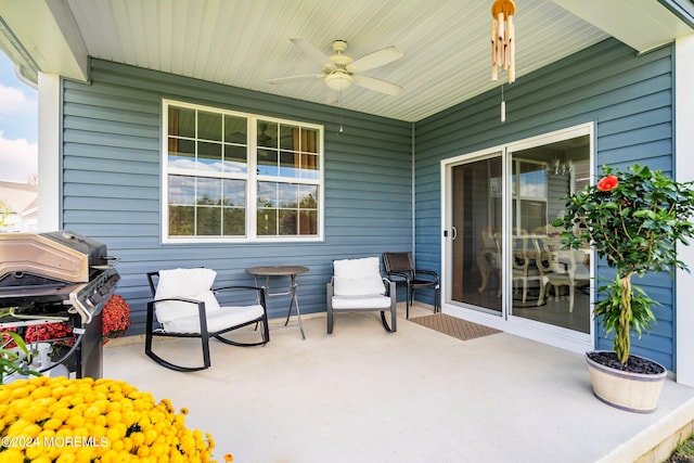 view of patio featuring a grill and ceiling fan