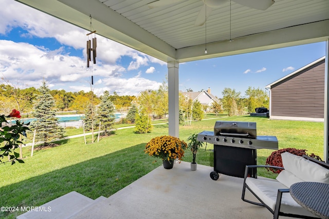 view of patio featuring a grill