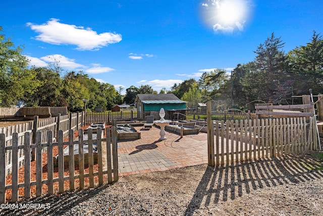 view of yard with fence and a gate