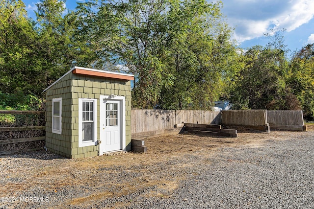 view of shed featuring a fenced backyard