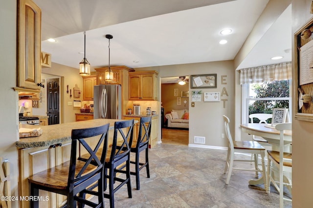 46 Markwood Dr, Howell, NJ 07731 - kitchen featuring stainless steel appliances, decorative light fixtures, baseboards, visible vents, and a ceiling fan