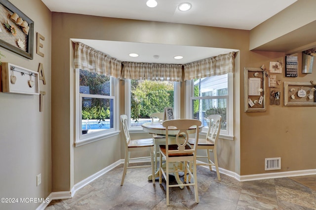 dining area with a wealth of natural light