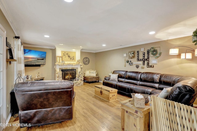 46 Markwood Dr, Howell, NJ 07731 - living area featuring crown molding, recessed lighting, wood finished floors, and a warm lit fireplace