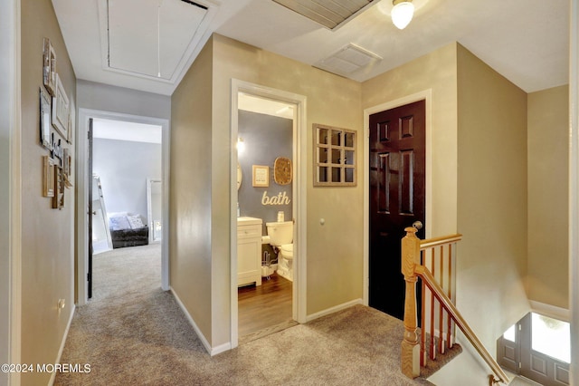46 Markwood Dr, Howell, NJ 07731 - corridor featuring an upstairs landing, attic access, visible vents, and carpet