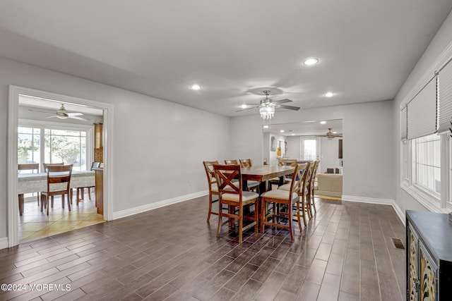 dining area with dark wood-type flooring