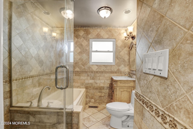 full bathroom with tile patterned flooring, toilet, separate shower and tub, tile walls, and vanity