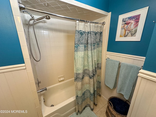 bathroom featuring shower / bath combo and tile patterned floors