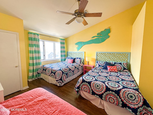 bedroom featuring dark hardwood / wood-style floors and ceiling fan