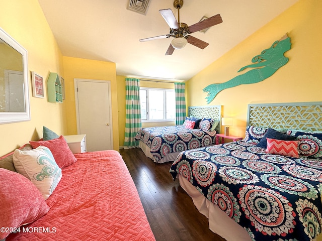 bedroom featuring dark wood-type flooring and ceiling fan