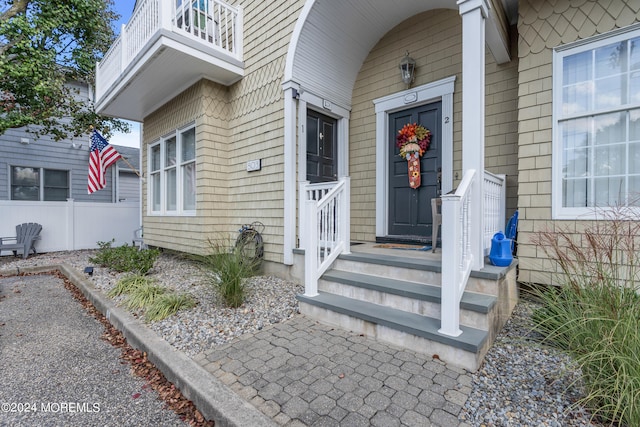 doorway to property with a balcony