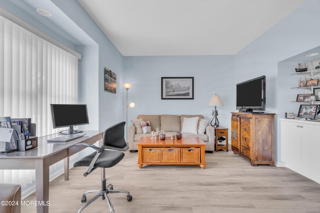 home office with light wood-type flooring