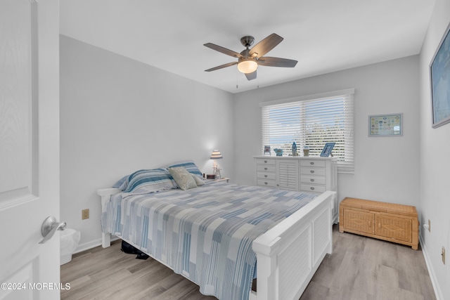 bedroom featuring light hardwood / wood-style flooring and ceiling fan