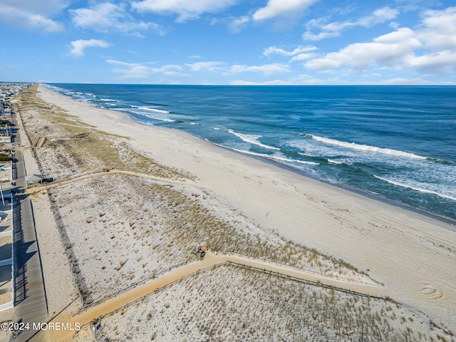 property view of water featuring a beach view