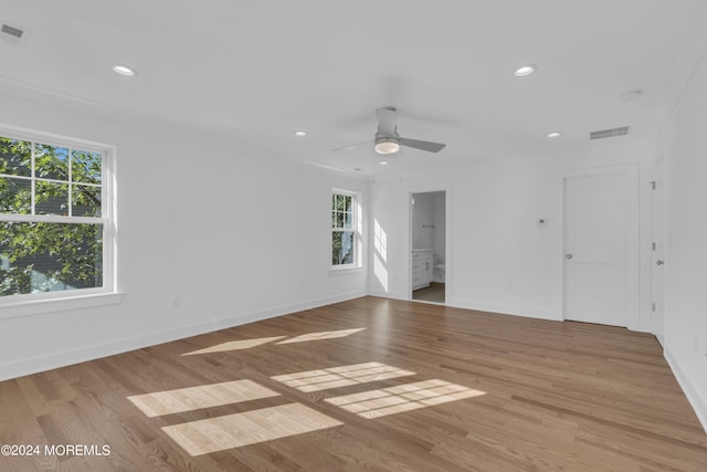 interior space featuring light wood finished floors, visible vents, and recessed lighting