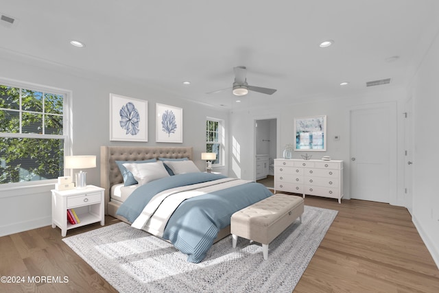 bedroom featuring visible vents, wood finished floors, and recessed lighting