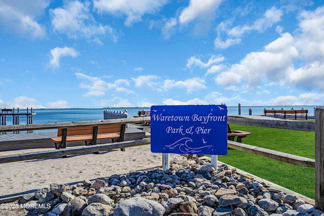 view of property's community featuring a water view