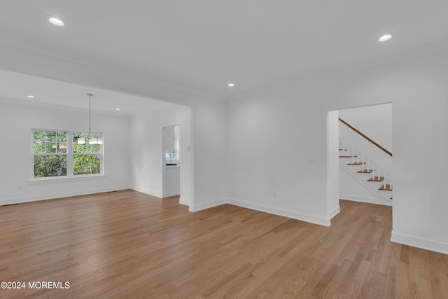 unfurnished living room with recessed lighting and light wood-style floors