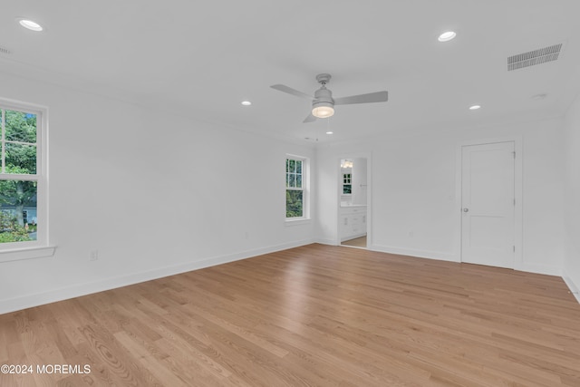 spare room featuring recessed lighting, visible vents, light wood-style flooring, a ceiling fan, and baseboards