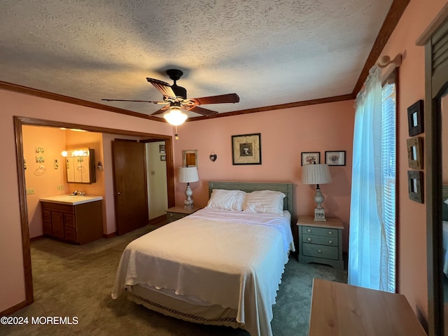 carpeted bedroom featuring ceiling fan, a textured ceiling, and ornamental molding