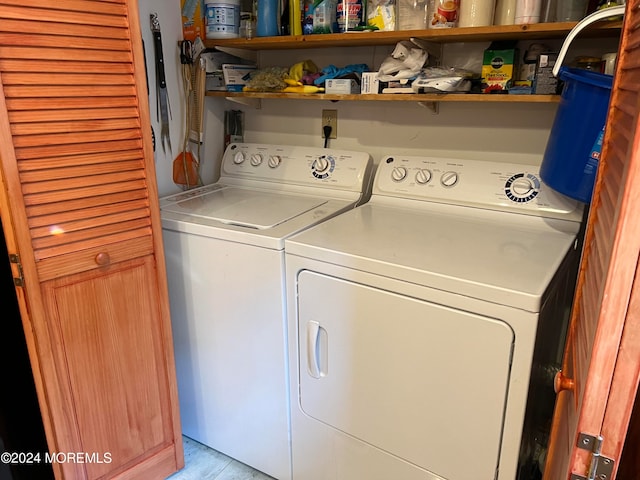 laundry room featuring separate washer and dryer