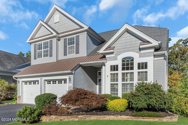 craftsman-style house with a garage