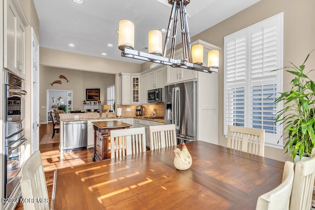 dining room featuring light hardwood / wood-style flooring