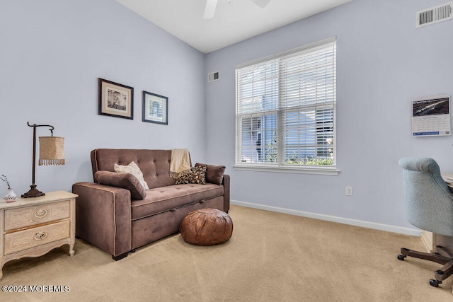 interior space featuring ceiling fan and a healthy amount of sunlight