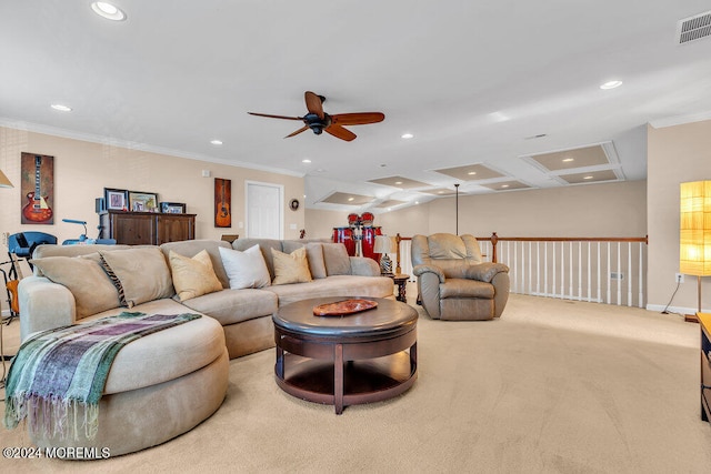 living room with ceiling fan, coffered ceiling, ornamental molding, and light colored carpet