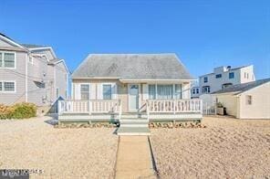 view of front of property with a deck