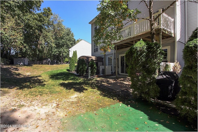 view of yard with a deck