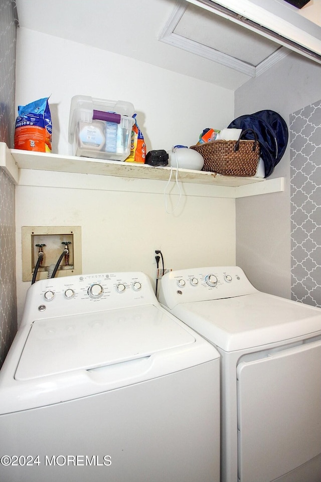 laundry area with separate washer and dryer